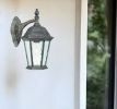 Two Light Brown Hanging Carousel Lantern Wall Light